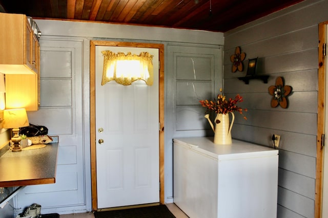 606 Center Ave N, Blooming Prairie, MN 55917 - doorway to outside featuring wood ceiling