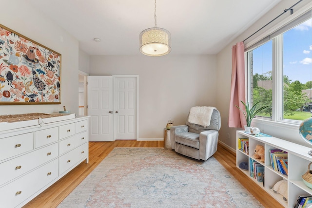 600 Sibley Ct, Mendota Heights, MN 55118 - sitting room featuring light wood finished floors and baseboards