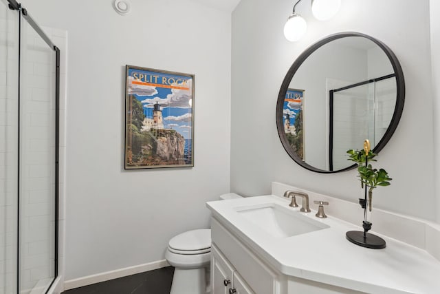 600 Sibley Ct, Mendota Heights, MN 55118 - full bath with vanity, toilet, a tile shower, tile patterned floors, and baseboards