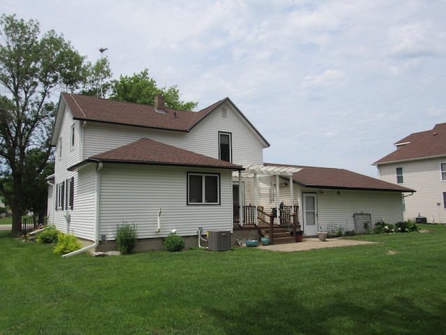 909 6th Ave, Brewster, MN 56119 - rear view of house featuring a pergola, a shingled roof, and a yard