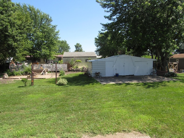 909 6th Ave, Brewster, MN 56119 - view of grassy yard with a storage shed