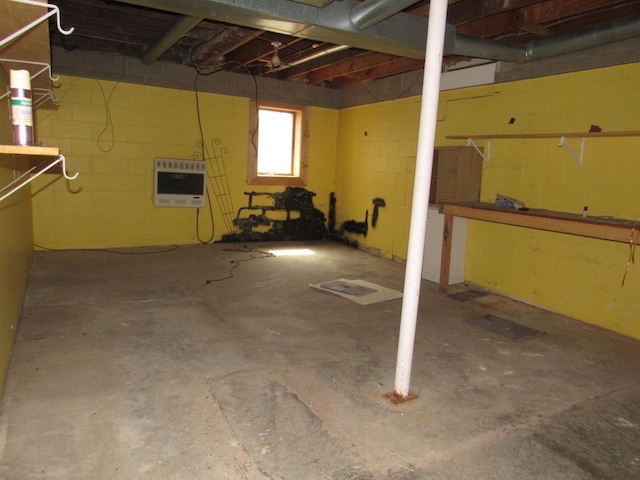 909 6th Ave, Brewster, MN 56119 - basement with heating unit and concrete block wall