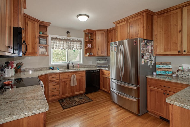 6823 Re Echo Ridge Dr NE, Remer, MN 56672 - kitchen featuring freestanding refrigerator, black dishwasher, open shelves, a sink, and brown cabinetry