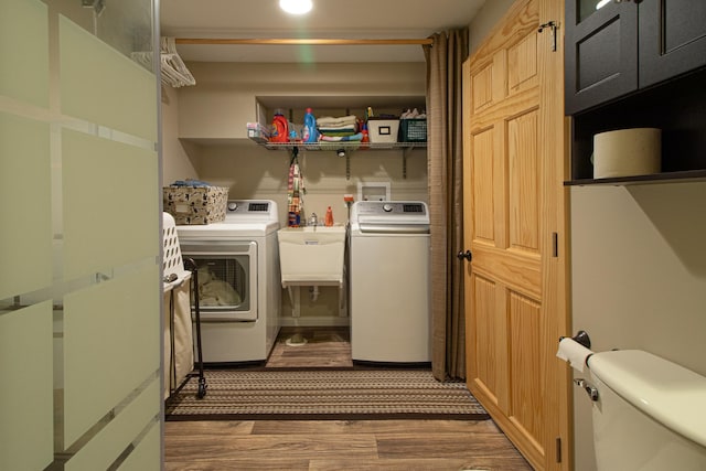 6823 Re Echo Ridge Dr NE, Remer, MN 56672 - laundry area featuring washer and dryer and wood finished floors