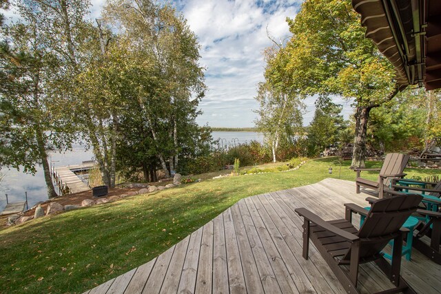 6823 Re Echo Ridge Dr NE, Remer, MN 56672 - deck featuring a water view and a yard