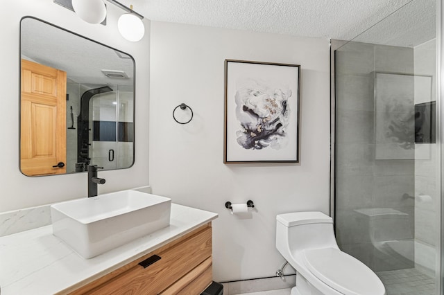 2665 Oriole Ave N, West Lakeland Twp, MN 55082 - full bathroom with toilet, a textured ceiling, vanity, and a shower stall