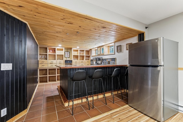 2665 Oriole Ave N, West Lakeland Twp, MN 55082 - bar area with freestanding refrigerator and wooden ceiling