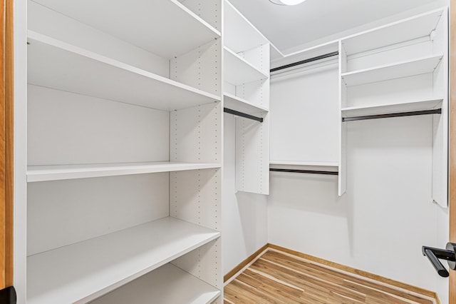 2665 Oriole Ave N, West Lakeland Twp, MN 55082 - walk in closet with wood finished floors