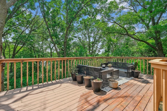 2665 Oriole Ave N, West Lakeland Twp, MN 55082 - wooden terrace with outdoor lounge area