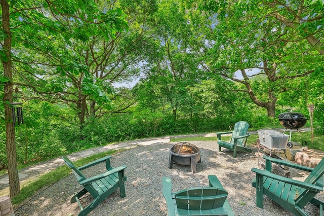 2665 Oriole Ave N, West Lakeland Twp, MN 55082 - view of patio / terrace featuring a fire pit