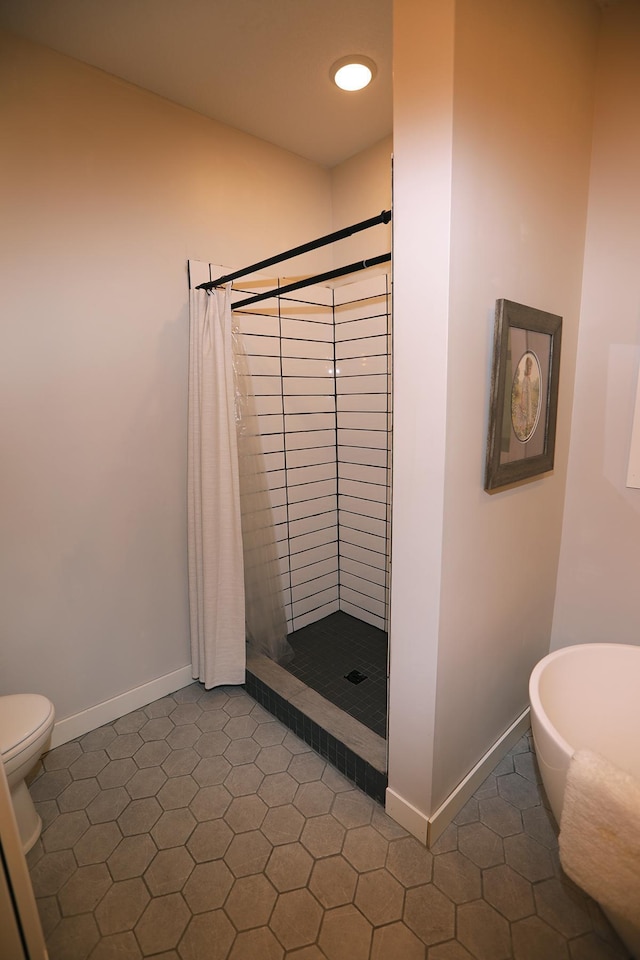 5004 W Rd, Silver Twp, MN 55767 - full bath with toilet, a stall shower, and baseboards