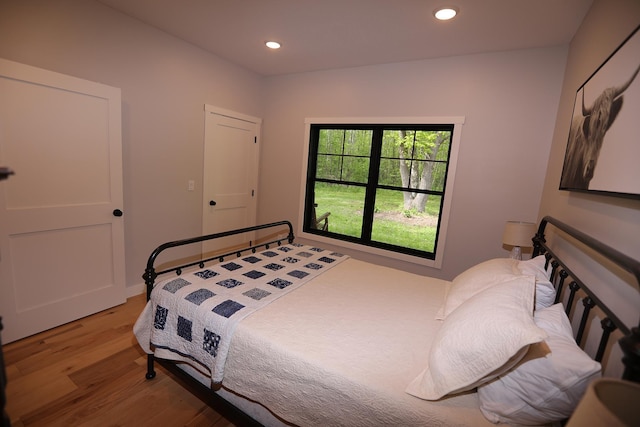 5004 W Rd, Silver Twp, MN 55767 - bedroom featuring light wood-style flooring and recessed lighting