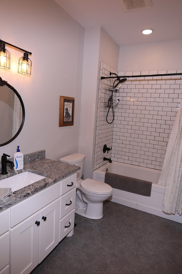 5004 W Rd, Silver Twp, MN 55767 - bathroom with vanity, shower / bath combo with shower curtain, and toilet