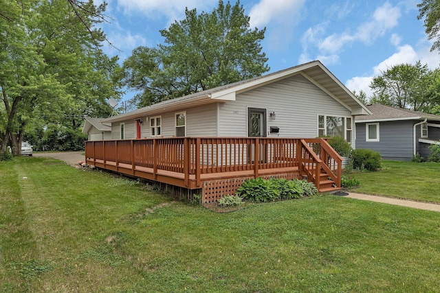 2007 8th St N, Saint Cloud, MN 56303 - back of property featuring a lawn and a wooden deck