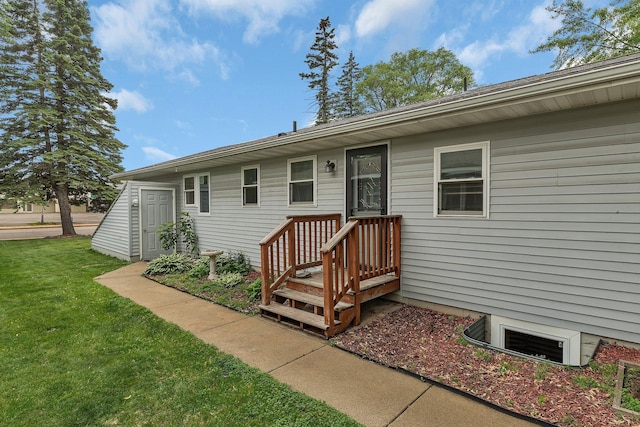 2007 8th St N, Saint Cloud, MN 56303 - back of house featuring a yard
