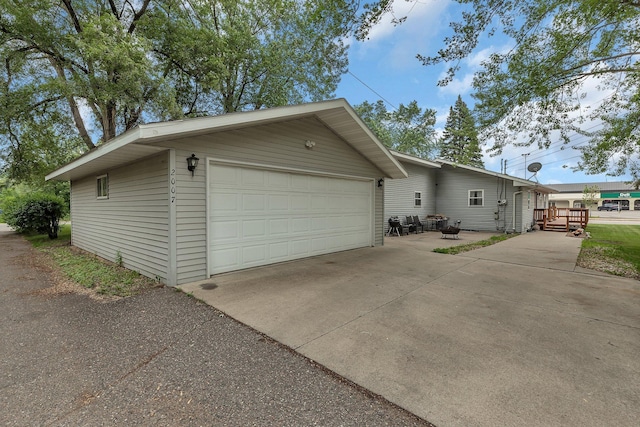 2007 8th St N, Saint Cloud, MN 56303 - view of front of property featuring an outdoor structure and a deck