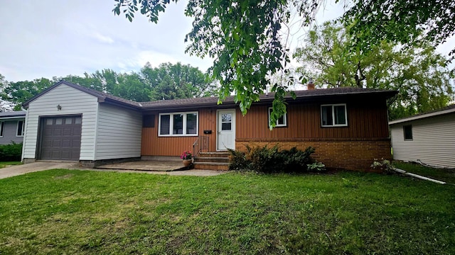 1309 Elm Ave N, Wheaton, MN 56296 - ranch-style house with a garage, brick siding, a front yard, driveway, and a chimney