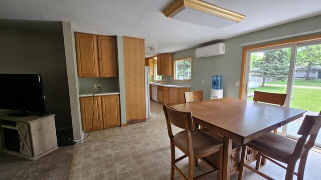1309 Elm Ave N, Wheaton, MN 56296 - dining room with a wall unit AC