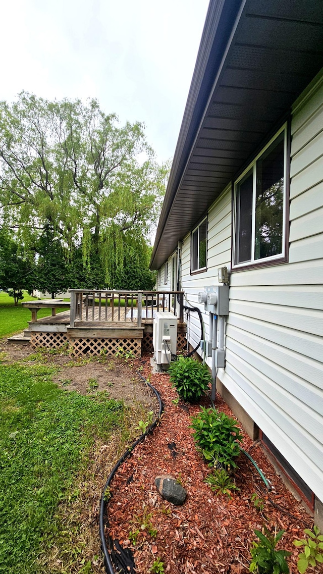 1309 Elm Ave N, Wheaton, MN 56296 - view of yard featuring a wooden deck and a cooling unit