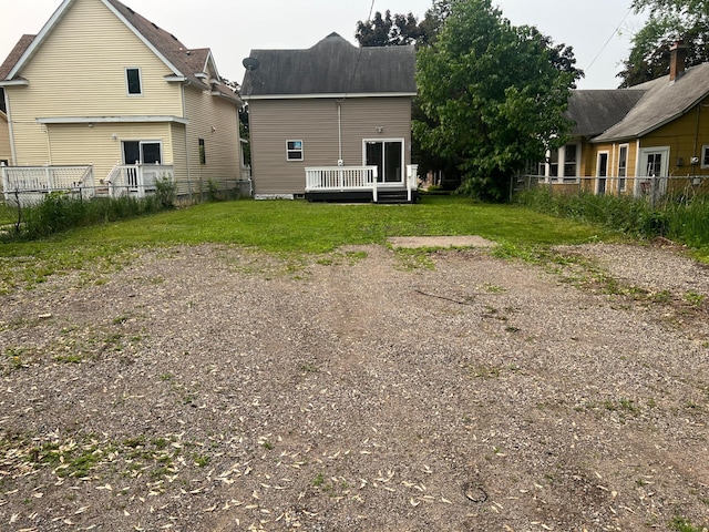 975 4th St E, Saint Paul, MN 55106 - back of property featuring a wooden deck