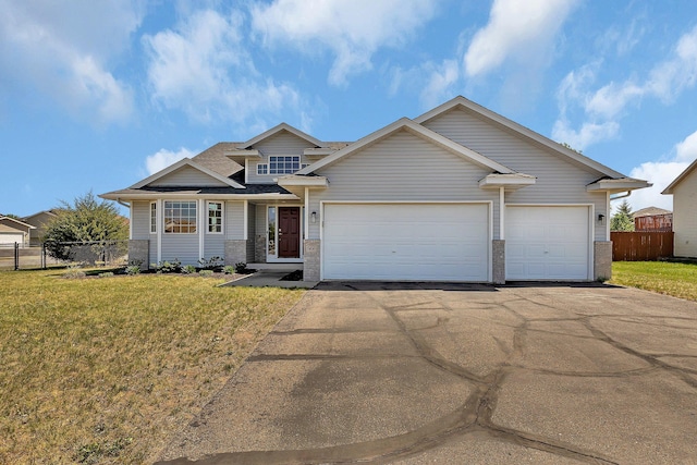 900 Isabella Ave, Clearwater, MN 55320 - view of front of house featuring driveway, an attached garage, brick siding, and roof with shingles