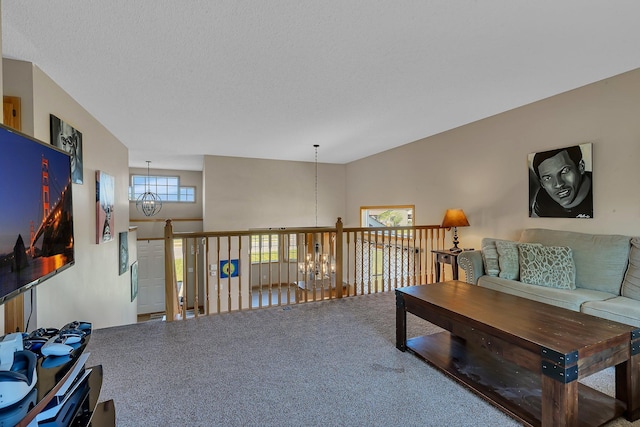900 Isabella Ave, Clearwater, MN 55320 - carpeted living room with a chandelier