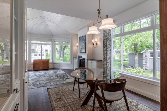 2105 7th Ave S, Saint Cloud, MN 56301 - dining space featuring plenty of natural light, wood finished floors, baseboards, and wooden ceiling