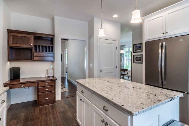 2105 7th Ave S, Saint Cloud, MN 56301 - kitchen with freestanding refrigerator, dark wood-style floors, white cabinets, open shelves, and recessed lighting