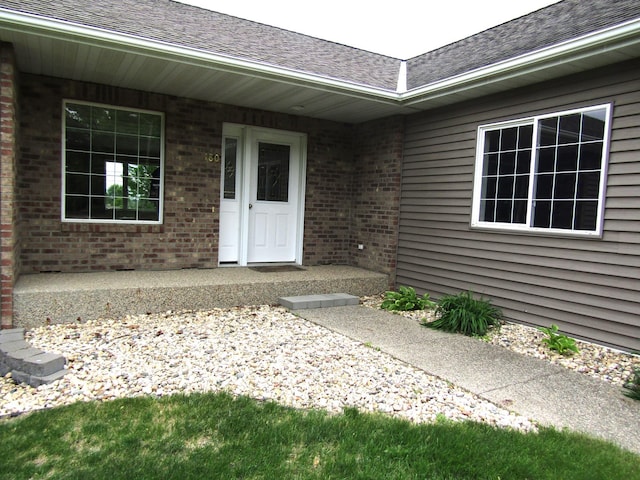180 Bordson St, Appleton, MN 56208 - entrance to property with brick siding and roof with shingles