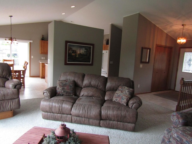 180 Bordson St, Appleton, MN 56208 - living room with a chandelier, lofted ceiling, light colored carpet, and baseboards