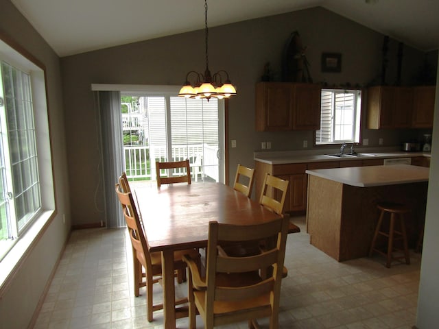 180 Bordson St, Appleton, MN 56208 - dining area featuring lofted ceiling, light flooring, and a chandelier
