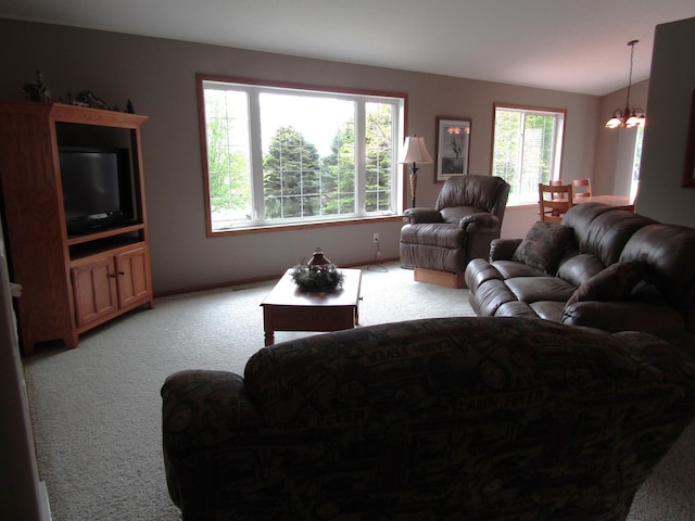 180 Bordson St, Appleton, MN 56208 - living room with a chandelier and light colored carpet