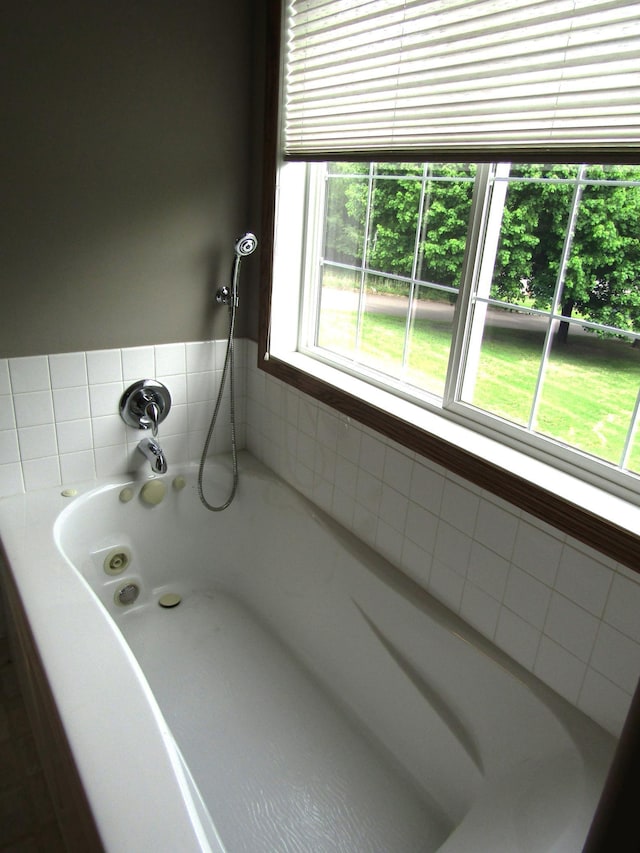 180 Bordson St, Appleton, MN 56208 - bathroom featuring a jetted tub