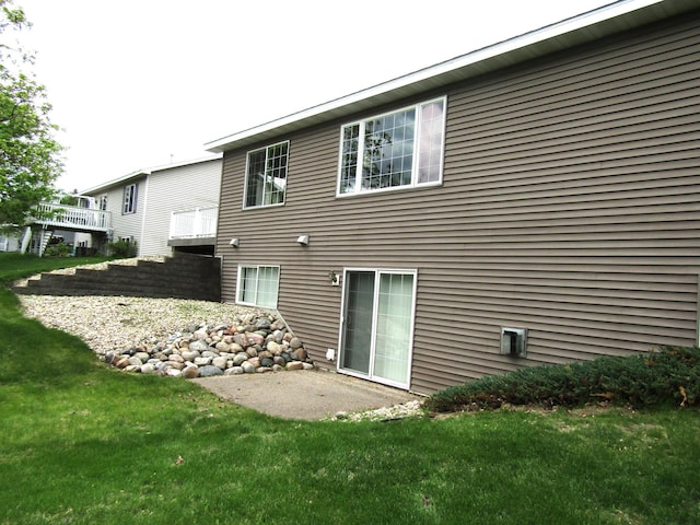 180 Bordson St, Appleton, MN 56208 - rear view of house featuring a yard