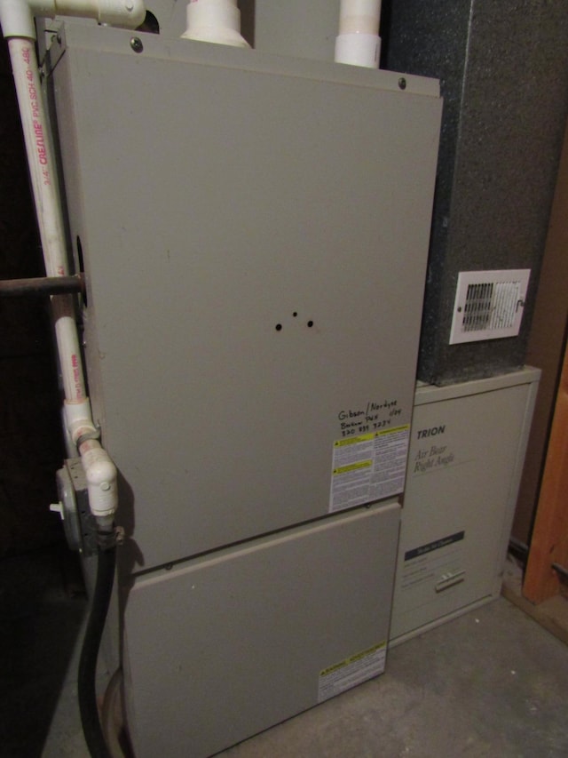 180 Bordson St, Appleton, MN 56208 - utility room with heating unit