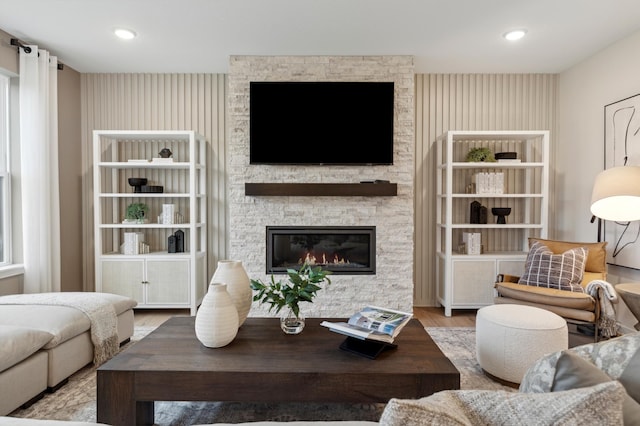 14625 105th Pl N, Maple Grove, MN 55369 - living area with wood finished floors, a fireplace, and recessed lighting