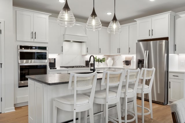 14625 105th Pl N, Maple Grove, MN 55369 - kitchen featuring stainless steel appliances, light wood-type flooring, white cabinets, and recessed lighting