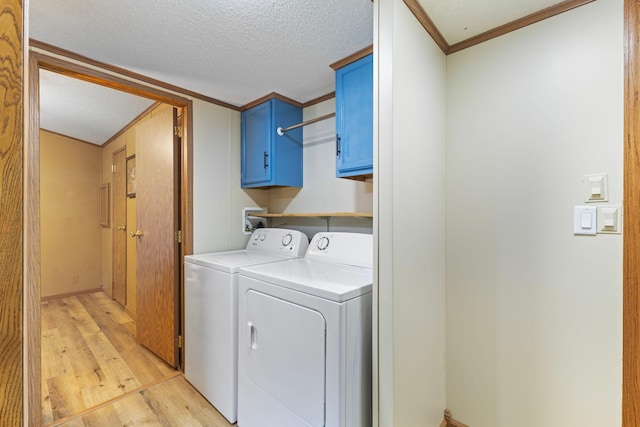 4799 Bridgewater Rd, Fair Haven Twp, MN 55382 - laundry area featuring cabinet space, separate washer and dryer, light wood-style floors, a textured ceiling, and crown molding