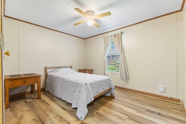 4799 Bridgewater Rd, Fair Haven Twp, MN 55382 - bedroom with ornamental molding, light wood-type flooring, ceiling fan, and a textured ceiling