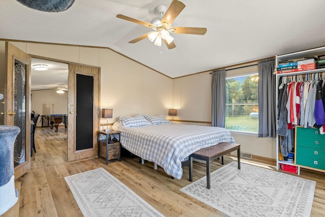 4799 Bridgewater Rd, Fair Haven Twp, MN 55382 - bedroom with lofted ceiling, light wood finished floors, and a ceiling fan
