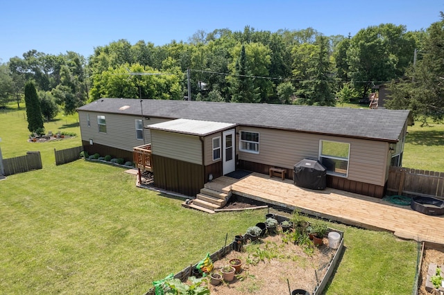 4799 Bridgewater Rd, Fair Haven Twp, MN 55382 - back of house with a fenced backyard, a wooden deck, and roof with shingles