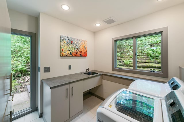 N7775 920th St, River Falls, WI 54022 - washroom with independent washer and dryer, plenty of natural light, light tile patterned flooring, and recessed lighting