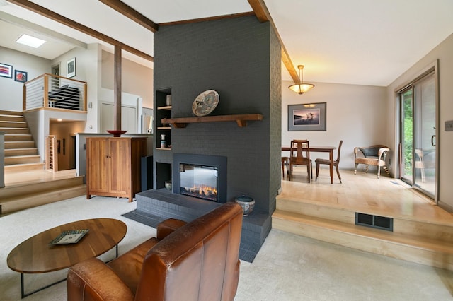 N7775 920th St, River Falls, WI 54022 - living room with light carpet, stairs, a brick fireplace, high vaulted ceiling, and beamed ceiling