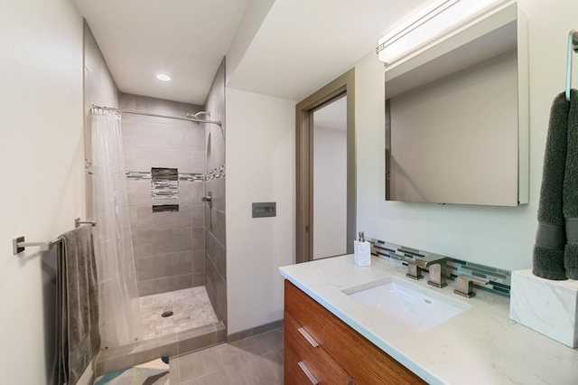 N7775 920th St, River Falls, WI 54022 - full bath featuring vanity, tiled shower, tile patterned floors, and recessed lighting