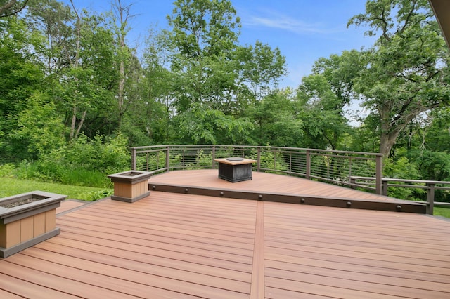 N7775 920th St, River Falls, WI 54022 - wooden deck with view of scattered trees