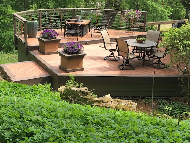 N7775 920th St, River Falls, WI 54022 - wooden terrace featuring outdoor dining space