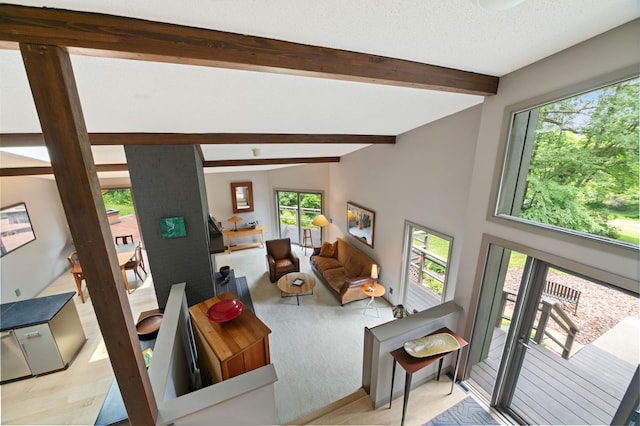 N7775 920th St, River Falls, WI 54022 - living area with light carpet and a brick fireplace