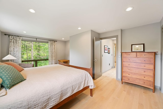N7775 920th St, River Falls, WI 54022 - bedroom with light wood-type flooring and recessed lighting