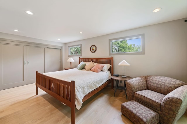 N7775 920th St, River Falls, WI 54022 - bedroom featuring light wood finished floors, a closet, and recessed lighting