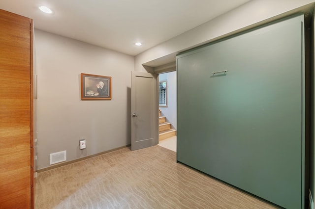 N7775 920th St, River Falls, WI 54022 - corridor featuring recessed lighting, stairs, and light colored carpet
